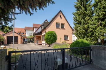 CHARMANT! Siedlungshäuschen mit sonnigem Garten in beliebter Wohnlage von FN-Löwental - Haus mit Hoftoreinfahrt (2434)