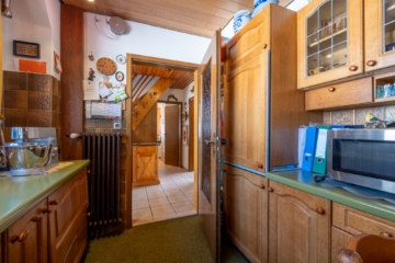 CHARMANT! Siedlungshäuschen mit sonnigem Garten in beliebter Wohnlage von FN-Löwental - Küche zu Flur,Arbeitszimmer (2461)